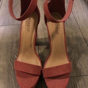 Pink suede platform heels